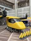 “The moment right now that we are living in is defined by things becoming real,” said Brian Yutko, Chief Executive Officer, Wisk Aero, whose yellow self-flying all-electric air taxi is a popular exhibit at the Summit.