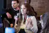 a woman holding a microphone