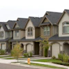 a row of houses with a fire hydrant