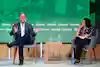a man and woman sitting in chairs
