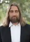 a man with long hair and beard