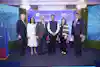 a group of people standing on a stage