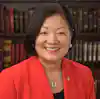a woman smiling at camera