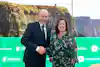 a man and woman shaking hands