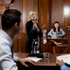 a woman speaking to a group of people