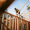 a man working on a wood frame