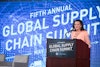 Ann Beauchesne welcomes attendees to the Fifth Annual Global Supply Chain Summit.