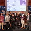Carbon Rivers staff receive their 2022 Dream Big Small Business of the Year Award on stage