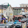 a street with cars and buildings
