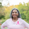 a woman wearing a pink shirt