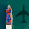 Experience the bustling activity of a thriving harbor with this aerial view of a cargo ship navigating through the sea. The expansive view showcases the maritime world in action, with the cargo ship gliding through the harbor against a backdrop of industry and trade. The bustling scene, filled with cargo containers, cranes, and maritime activity, epitomizes global commerce and transportation networks. This image perfectly conveys the vibrancy of international trade, logistics, and the interconnectedness of global economies. It's an ideal visual for projects portraying a thriving harbor's dynamic and vital essence.