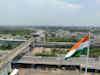 Aerial view of Delhi Metro Train running on the intersection of elevated railway tracks in New Delhi.