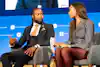 a man and woman sitting in chairs