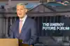 a man standing at a podium