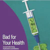a syringe with a green substance